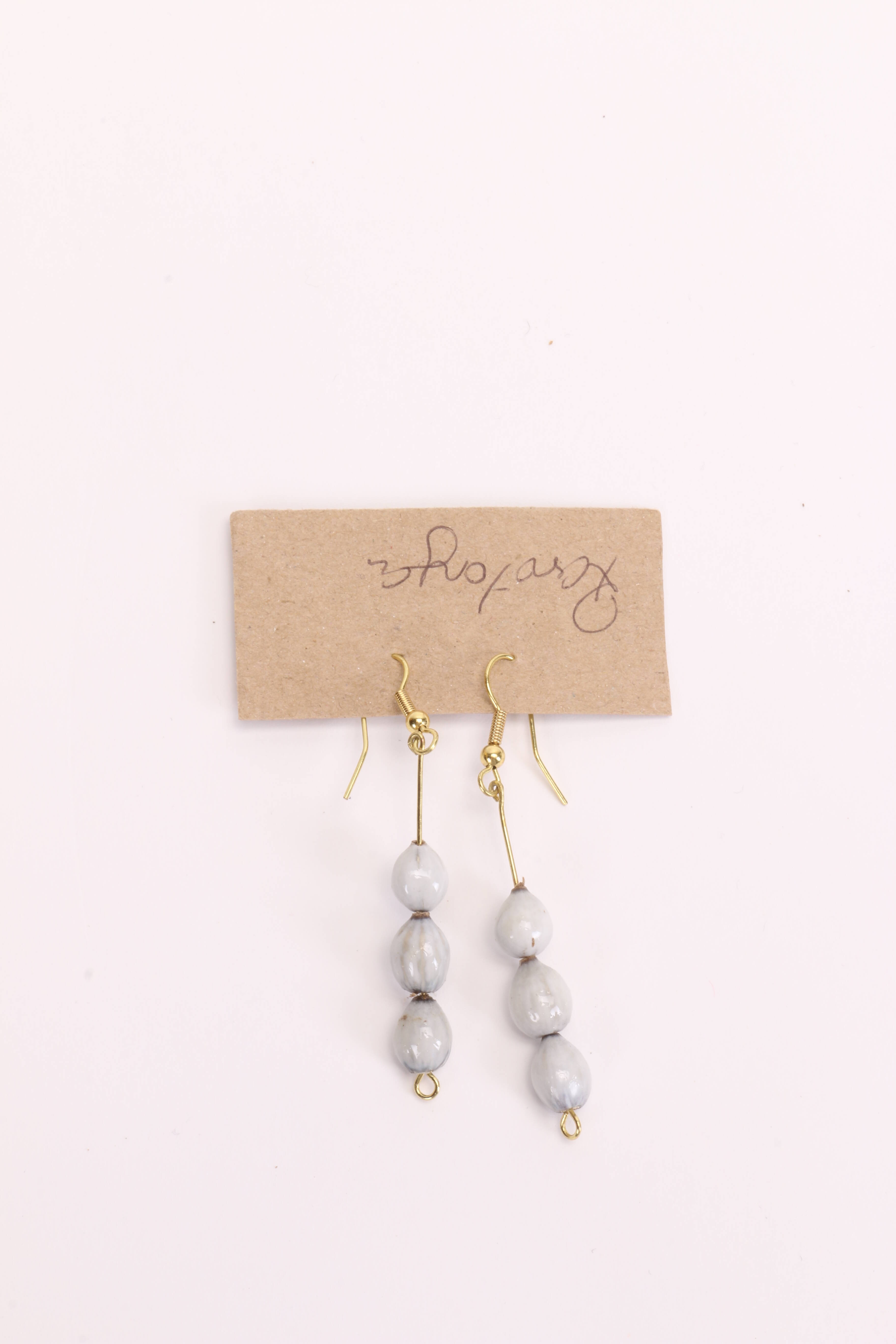 Poe, earrings; 2018.68.23;